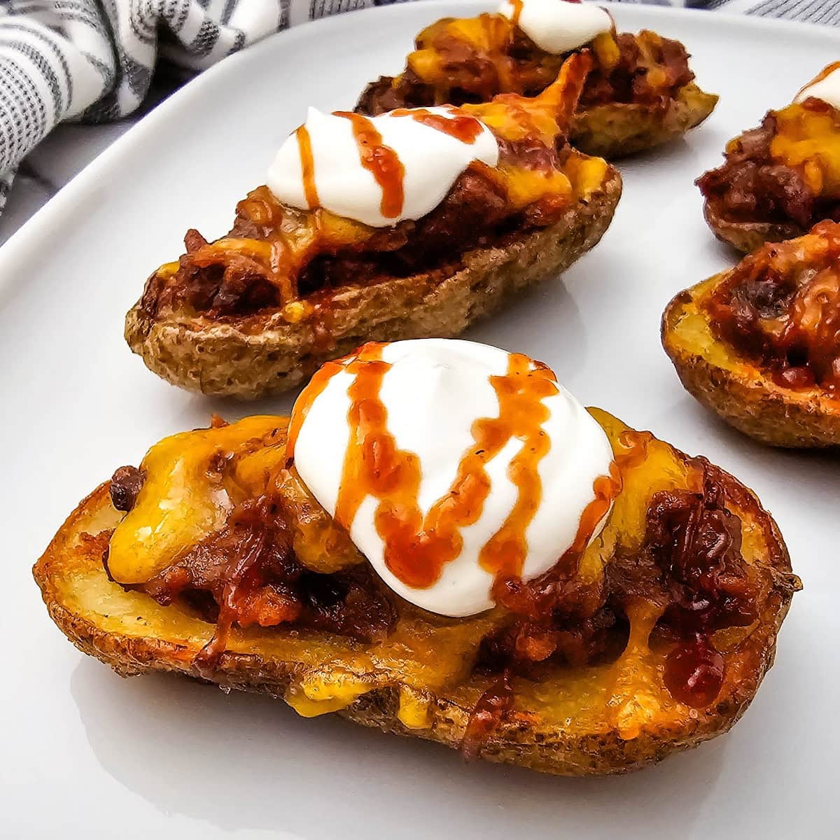 pulled pork potato skins featured image