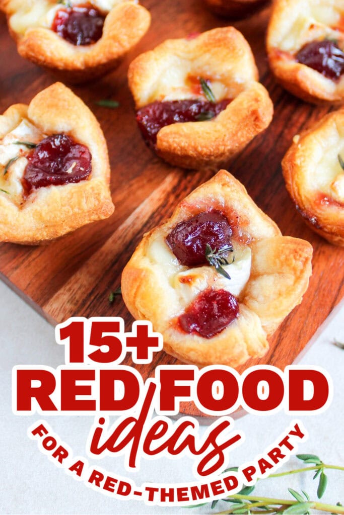 Mini savory cheesecake bites with cherry topping, perfect red food ideas for themed parties.