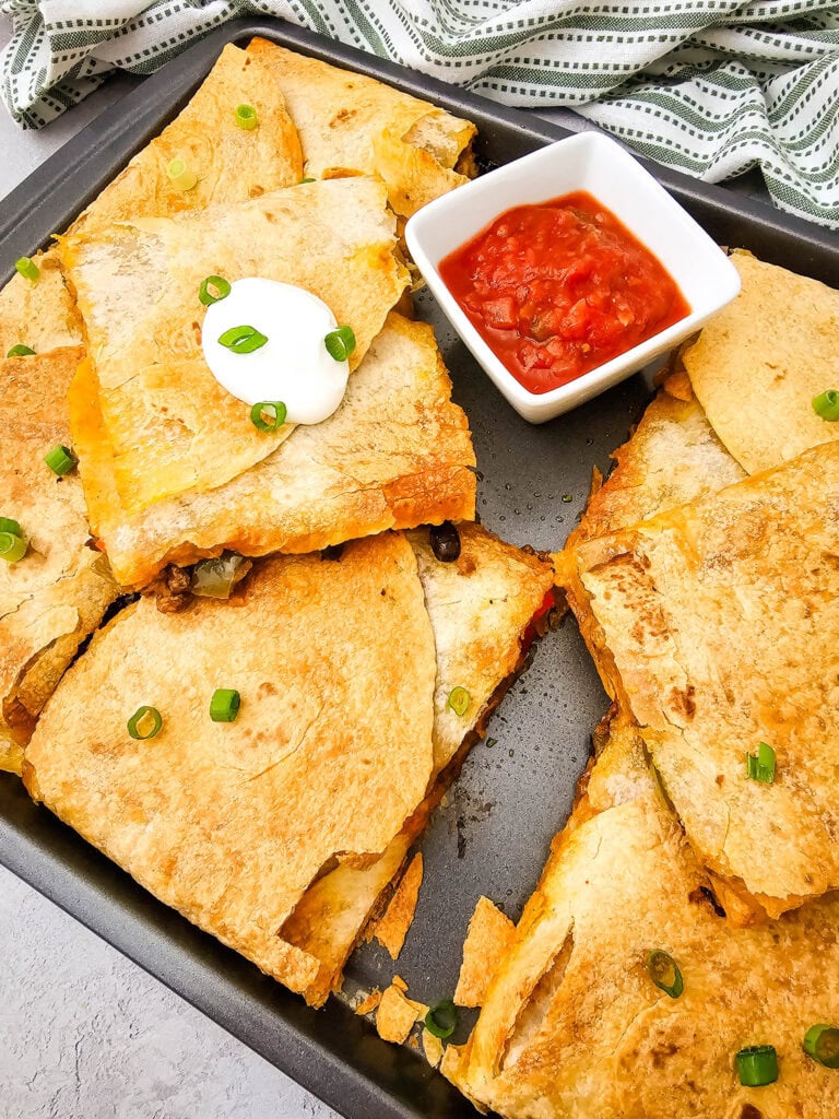 photo of the finished Sheet Pan Tex Mex Quesadillas