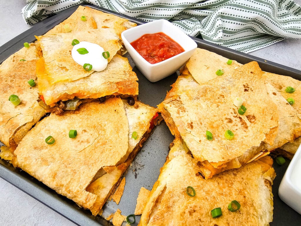 photo of the finished Sheet Pan Tex Mex Quesadillas
