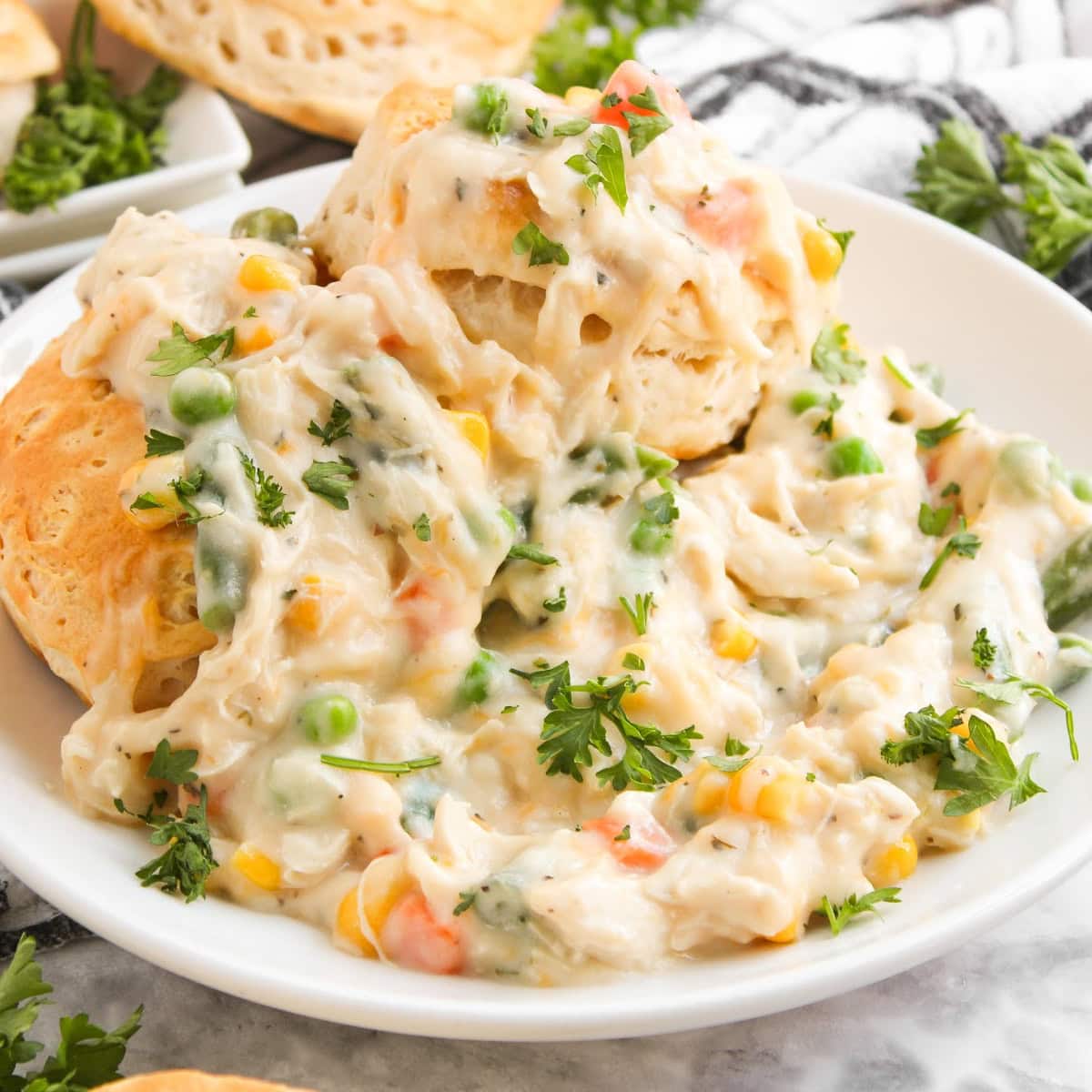 chicken pot pie over biscuits featured image