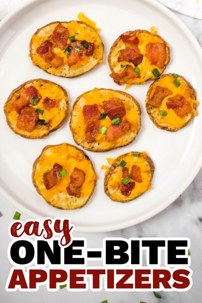 Miniature baked appetizers with cheese, bacon, and green onions on a white plate.