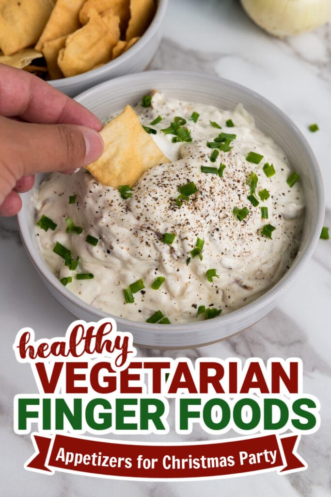 Vegetarian finger foods with creamy dip, green onions, and crispy chips for Christmas party.