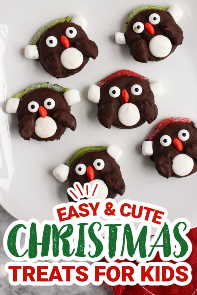 Cute Christmas penguin cookies with colorful decorations for kids.